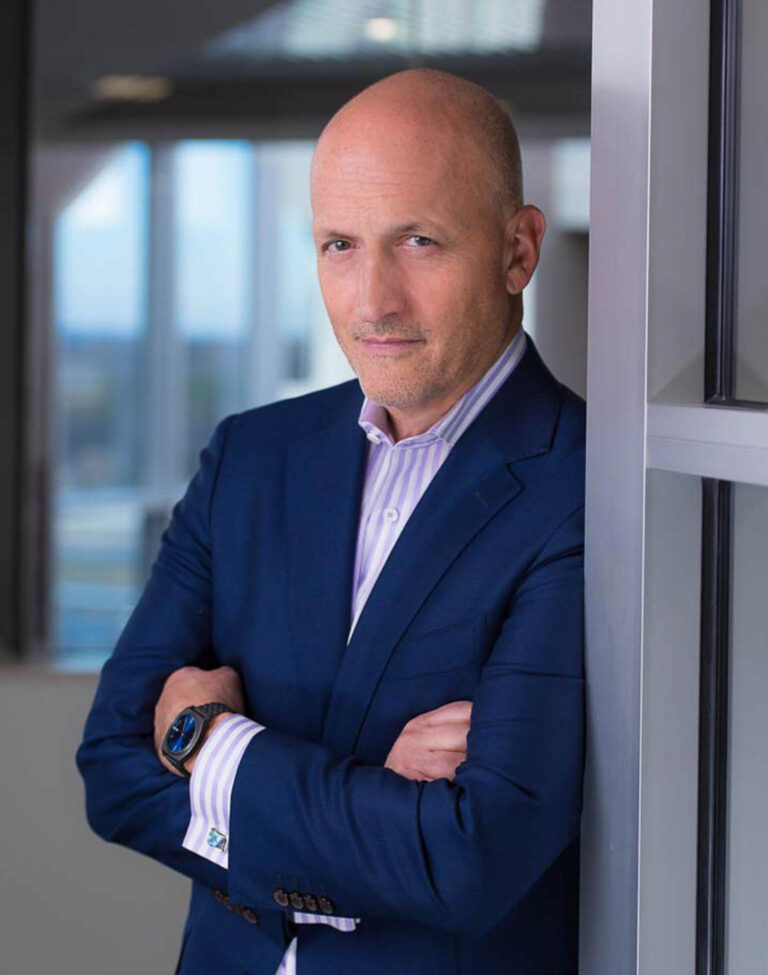 AI Headshot Generators vs. Real Portrait Photographers: Why Human Expertise Still Matters